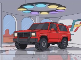 A red SUV is parked in a modern showroom with large windows and colorful ceiling lights.