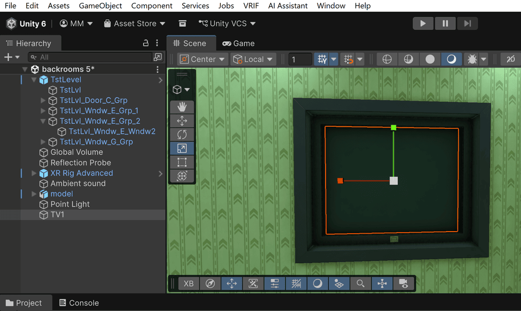 Unity game development software interface showing a 3D scene of a room with wallpaper and a black picture frame.